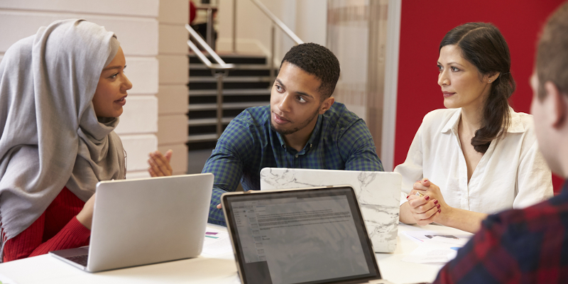 Four students having a discussion