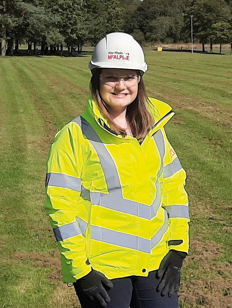 Student on site in high-vis jacket and hardhat