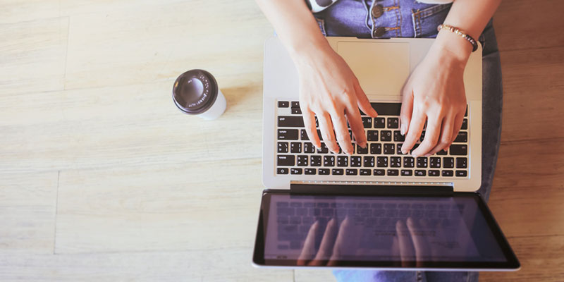 Person typing on a laptop