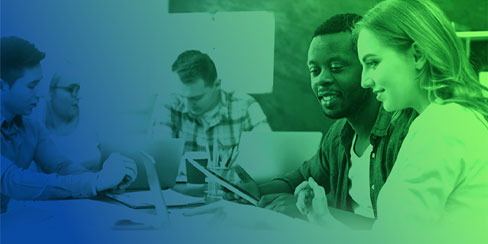 male black student and female white student working together at desk